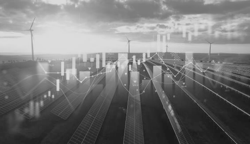 Solar panel arrays and wind turbines overlaid with financial chart graphics representing the energy sector.